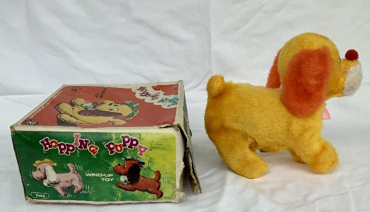 boxed circa 1950's-60's Japanese clockwork plush covered hopping puppy dog wind up toy